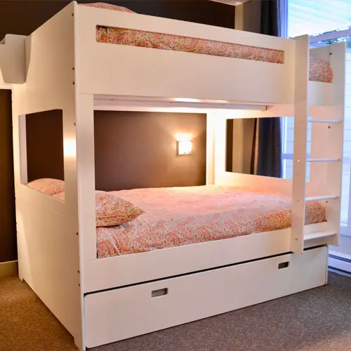 White bunk bed with front ladder
