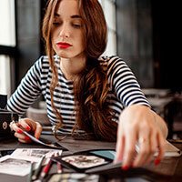 Women looking at prints