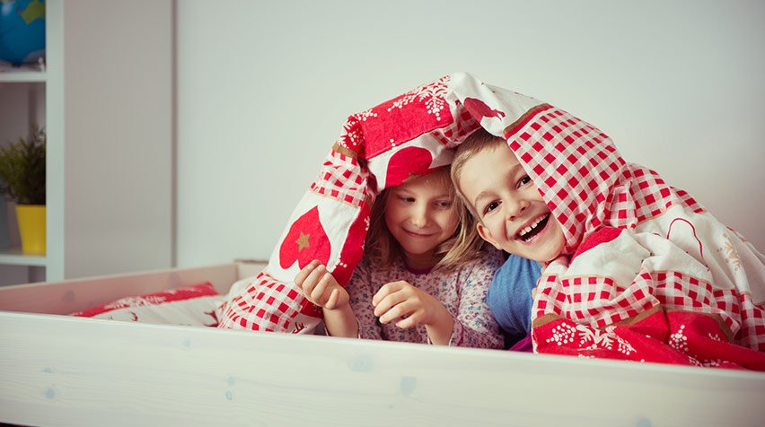 Kids hiding in a bunk bed