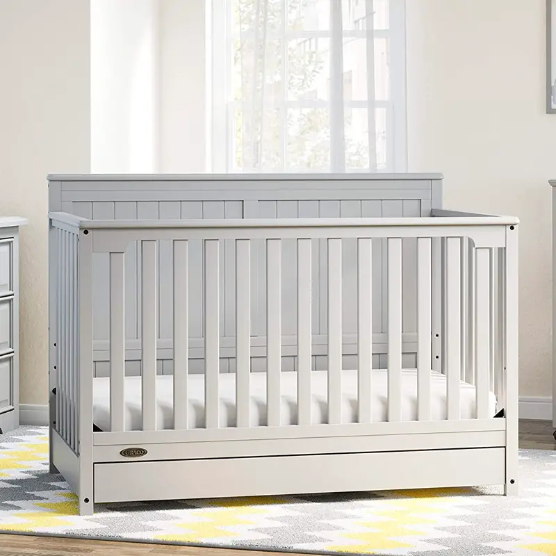 Convertible crib with drawer