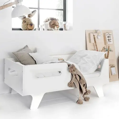 Classic mid-century wooden toddler bed in white