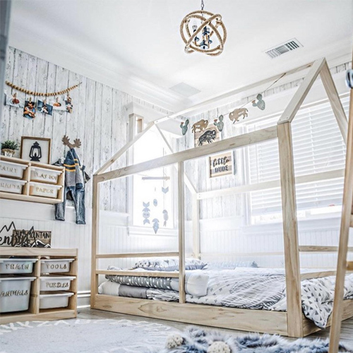 Full-sized house bed with mattress slats & railings