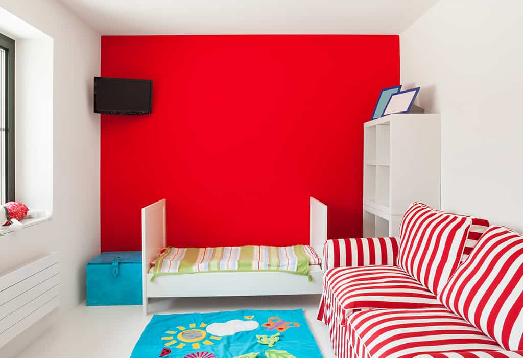 Red wall in kid's room