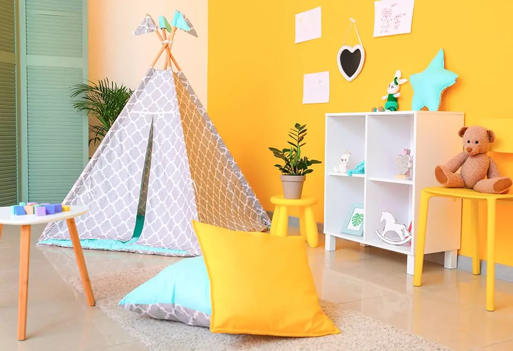 Yellow wall in kid's playroom