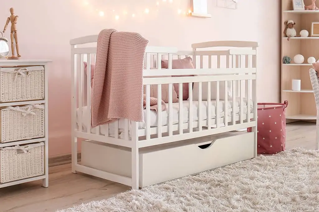 Baby girl crib with drawer storage