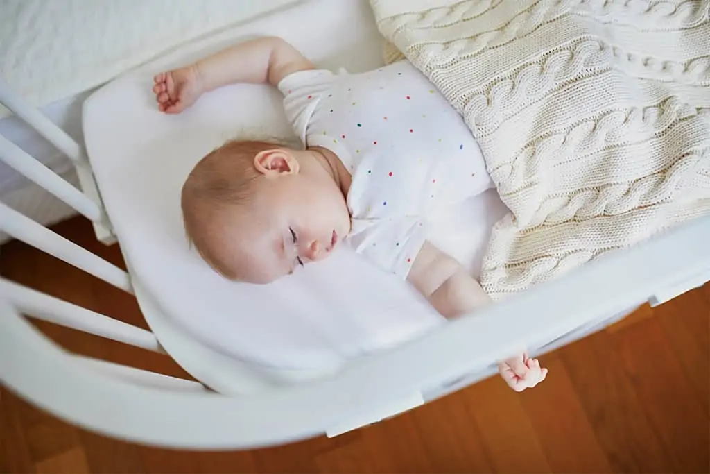 Baby sharing bedroom with parents