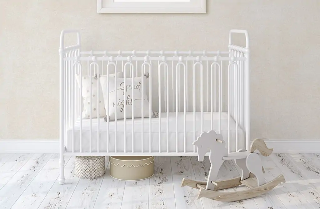 White metal crib